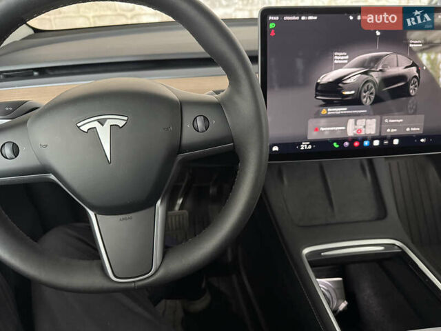 Черный Тесла Model Y, объемом двигателя 0 л и пробегом 2 тыс. км за 38300 $, фото 36 на Automoto.ua