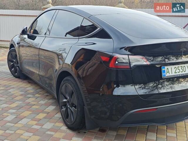 Черный Тесла Model Y, объемом двигателя 0 л и пробегом 13 тыс. км за 32000 $, фото 23 на Automoto.ua