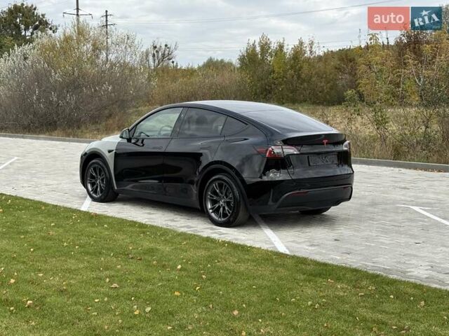 Черный Тесла Model Y, объемом двигателя 0 л и пробегом 14 тыс. км за 27500 $, фото 34 на Automoto.ua