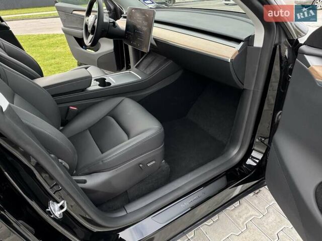 Черный Тесла Model Y, объемом двигателя 0 л и пробегом 14 тыс. км за 27500 $, фото 4 на Automoto.ua
