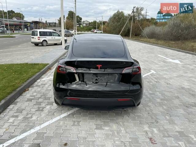 Черный Тесла Model Y, объемом двигателя 0 л и пробегом 14 тыс. км за 27500 $, фото 35 на Automoto.ua