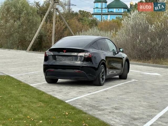 Черный Тесла Model Y, объемом двигателя 0 л и пробегом 14 тыс. км за 27500 $, фото 45 на Automoto.ua