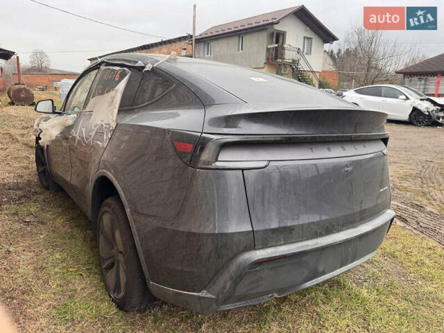 Черный Тесла Model Y, объемом двигателя 0 л и пробегом 24 тыс. км за 29700 $, фото 1 на Automoto.ua