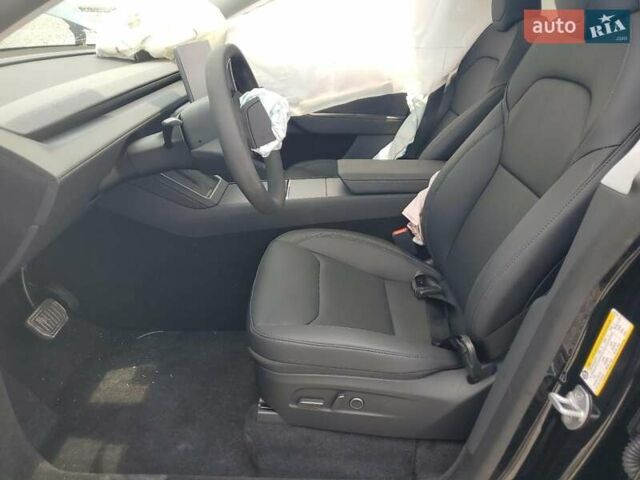 Черный Тесла Model Y, объемом двигателя 0 л и пробегом 1 тыс. км за 43000 $, фото 6 на Automoto.ua
