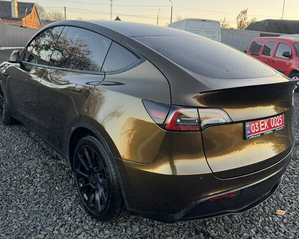 Коричневый Тесла Model Y, объемом двигателя 0 л и пробегом 84 тыс. км за 24990 $, фото 7 на Automoto.ua