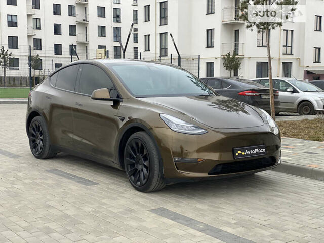 Коричневый Тесла Model Y, объемом двигателя 0 л и пробегом 66 тыс. км за 29999 $, фото 28 на Automoto.ua