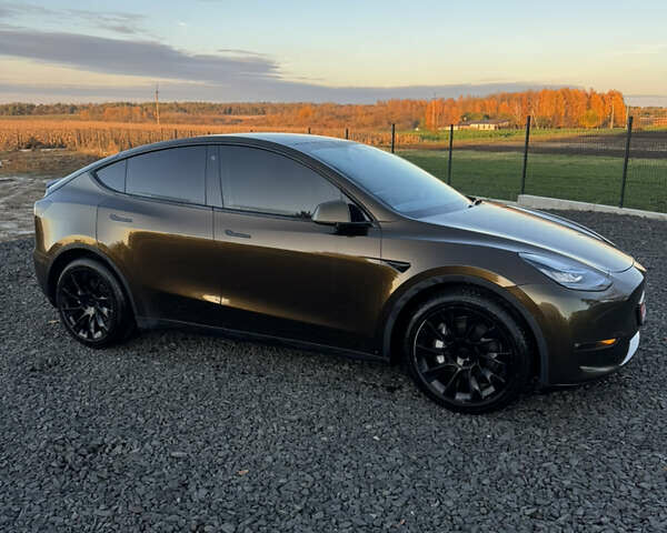 Коричневый Тесла Model Y, объемом двигателя 0 л и пробегом 84 тыс. км за 24990 $, фото 3 на Automoto.ua