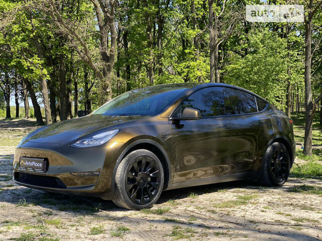 Коричневый Тесла Model Y, объемом двигателя 0 л и пробегом 66 тыс. км за 29999 $, фото 17 на Automoto.ua