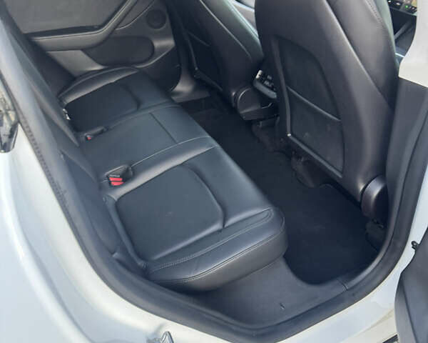 Коричневый Тесла Model Y, объемом двигателя 0 л и пробегом 84 тыс. км за 24990 $, фото 24 на Automoto.ua