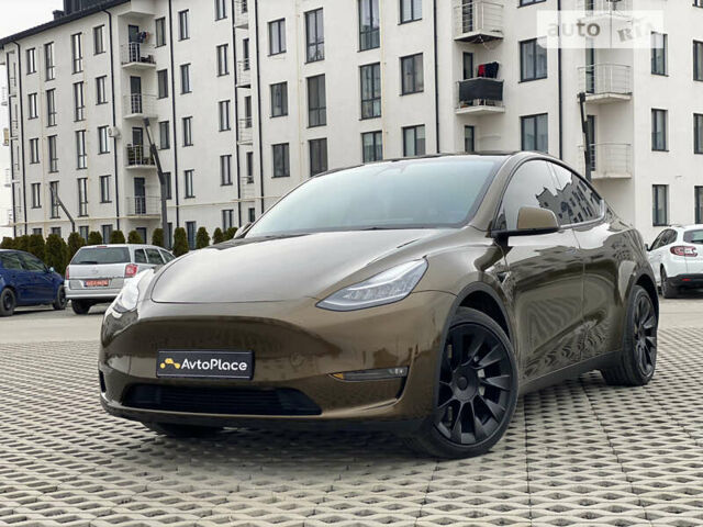 Коричневый Тесла Model Y, объемом двигателя 0 л и пробегом 66 тыс. км за 29999 $, фото 1 на Automoto.ua