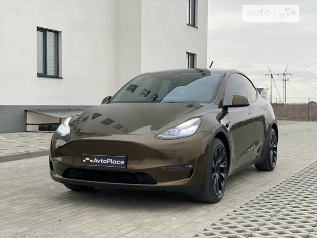 Коричневый Тесла Model Y, объемом двигателя 0 л и пробегом 66 тыс. км за 29999 $, фото 24 на Automoto.ua