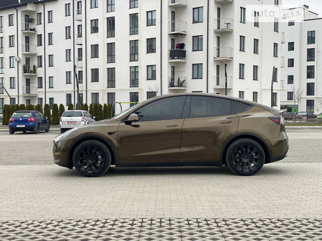 Коричневый Тесла Model Y, объемом двигателя 0 л и пробегом 66 тыс. км за 29999 $, фото 43 на Automoto.ua