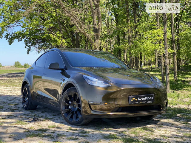 Коричневый Тесла Model Y, объемом двигателя 0 л и пробегом 66 тыс. км за 29999 $, фото 11 на Automoto.ua