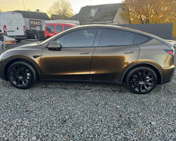 Коричневый Тесла Model Y, объемом двигателя 0 л и пробегом 84 тыс. км за 24990 $, фото 10 на Automoto.ua