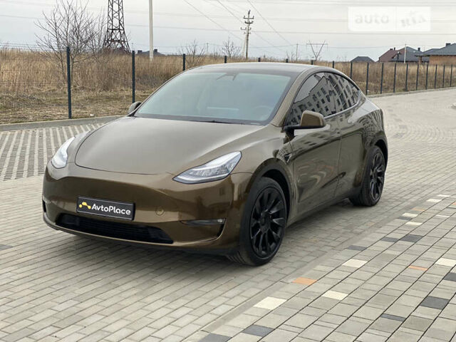 Коричневый Тесла Model Y, объемом двигателя 0 л и пробегом 66 тыс. км за 29999 $, фото 31 на Automoto.ua