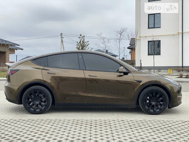 Коричневый Тесла Model Y, объемом двигателя 0 л и пробегом 66 тыс. км за 29999 $, фото 54 на Automoto.ua