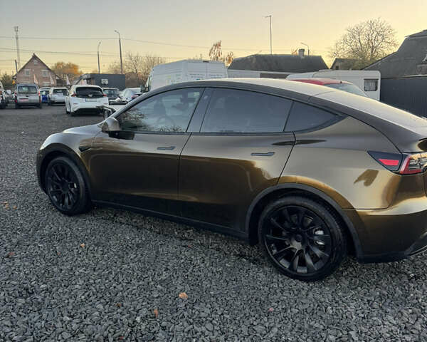 Коричневый Тесла Model Y, объемом двигателя 0 л и пробегом 84 тыс. км за 24990 $, фото 11 на Automoto.ua