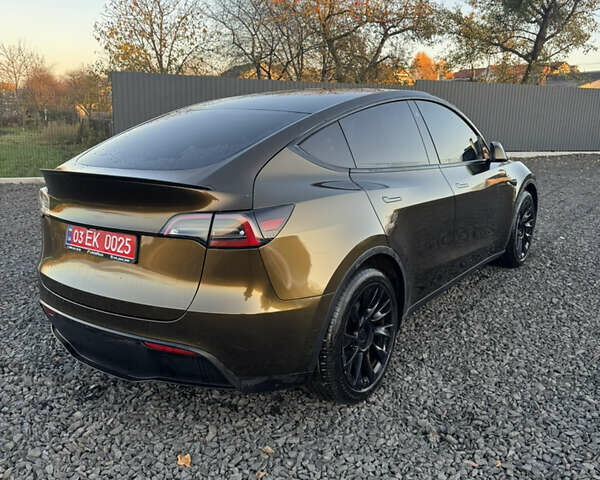 Коричневый Тесла Model Y, объемом двигателя 0 л и пробегом 84 тыс. км за 24990 $, фото 5 на Automoto.ua