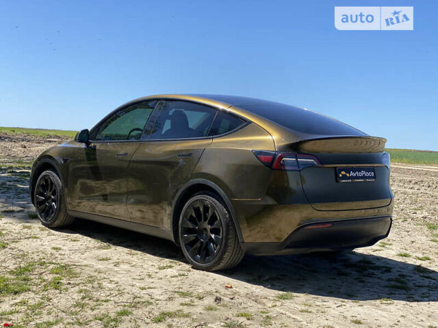 Коричневый Тесла Model Y, объемом двигателя 0 л и пробегом 66 тыс. км за 29999 $, фото 13 на Automoto.ua