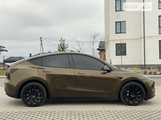 Коричневый Тесла Model Y, объемом двигателя 0 л и пробегом 66 тыс. км за 29999 $, фото 53 на Automoto.ua