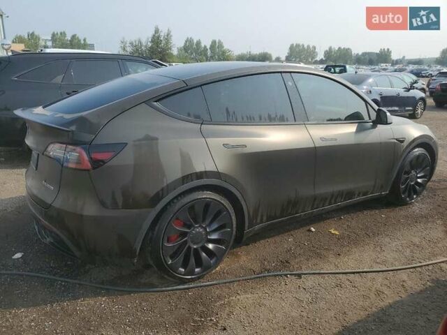 Коричневый Тесла Model Y, объемом двигателя 0 л и пробегом 52 тыс. км за 12000 $, фото 2 на Automoto.ua