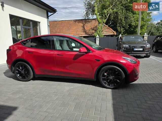 Червоний Тесла Model Y, об'ємом двигуна 0 л та пробігом 72 тис. км за 22999 $, фото 4 на Automoto.ua