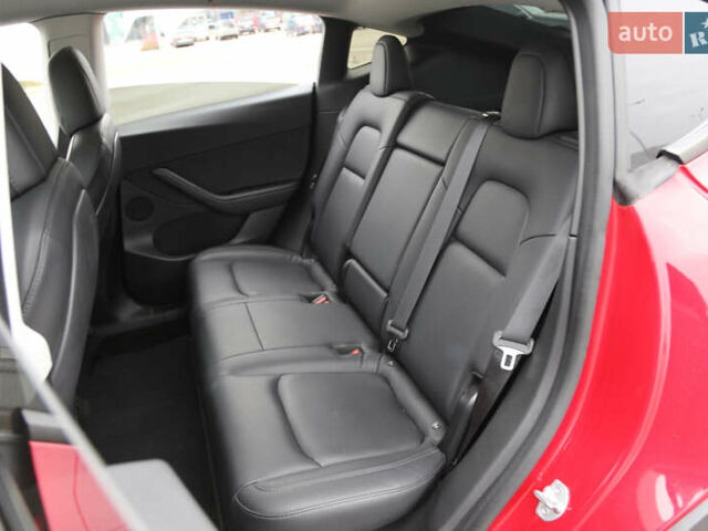 Красный Тесла Model Y, объемом двигателя 0 л и пробегом 52 тыс. км за 22700 $, фото 13 на Automoto.ua
