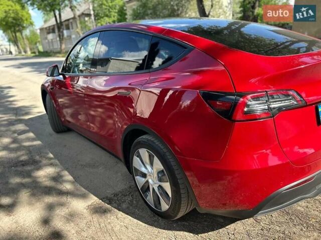 Красный Тесла Model Y, объемом двигателя 0 л и пробегом 97 тыс. км за 21300 $, фото 2 на Automoto.ua