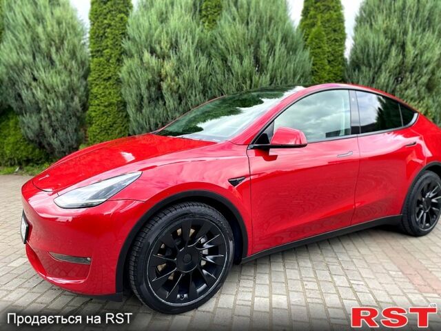 Красный Тесла Model Y, объемом двигателя 0 л и пробегом 70 тыс. км за 33000 $, фото 1 на Automoto.ua