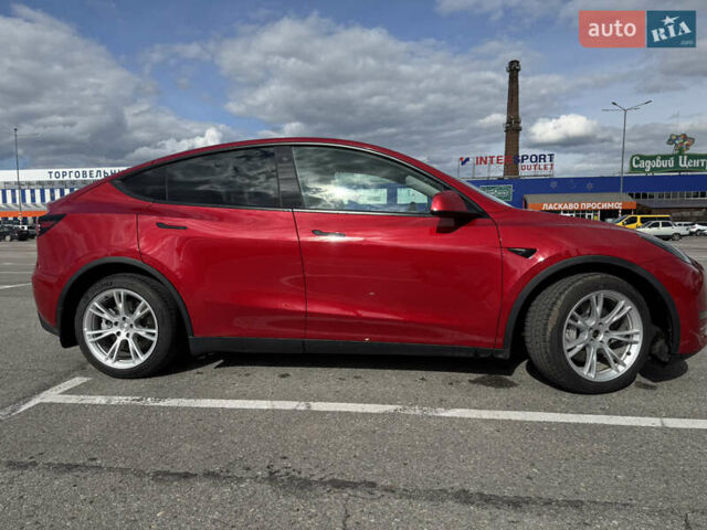 Червоний Тесла Model Y, об'ємом двигуна 0 л та пробігом 60 тис. км за 28500 $, фото 2 на Automoto.ua