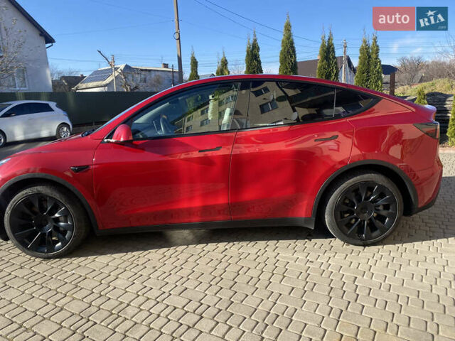 Червоний Тесла Model Y, об'ємом двигуна 0 л та пробігом 29 тис. км за 25750 $, фото 4 на Automoto.ua