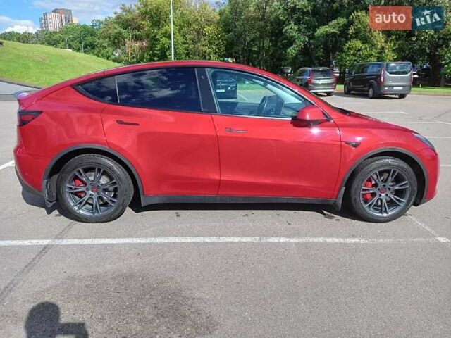 Красный Тесла Model Y, объемом двигателя 0 л и пробегом 70 тыс. км за 24500 $, фото 4 на Automoto.ua