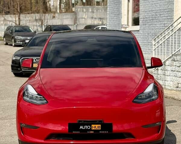 Красный Тесла Model Y, объемом двигателя 0 л и пробегом 75 тыс. км за 25000 $, фото 2 на Automoto.ua