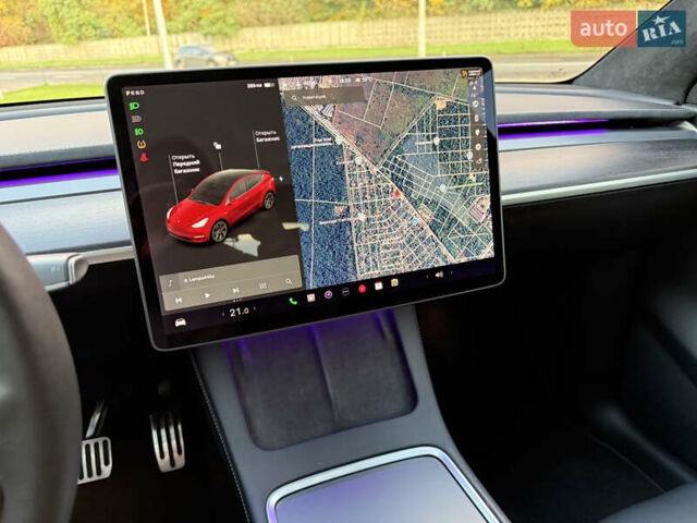 Красный Тесла Model Y, объемом двигателя 0 л и пробегом 60 тыс. км за 25000 $, фото 26 на Automoto.ua