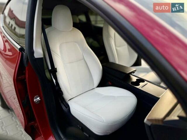 Красный Тесла Model Y, объемом двигателя 0 л и пробегом 100 тыс. км за 25350 $, фото 64 на Automoto.ua