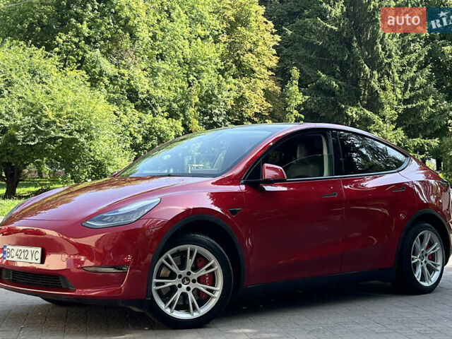Красный Тесла Model Y, объемом двигателя 0 л и пробегом 127 тыс. км за 22499 $, фото 1 на Automoto.ua