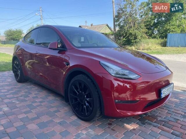 Красный Тесла Model Y, объемом двигателя 0 л и пробегом 81 тыс. км за 27500 $, фото 1 на Automoto.ua