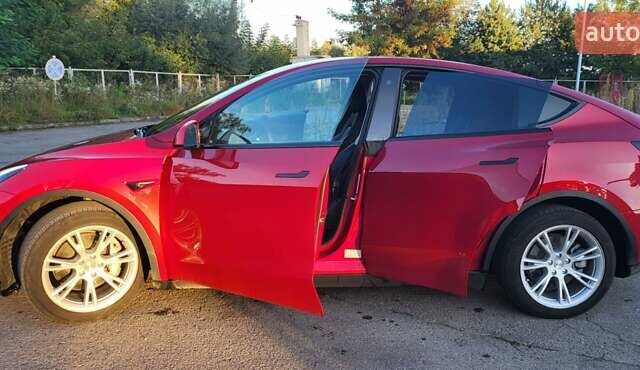 Красный Тесла Model Y, объемом двигателя 0 л и пробегом 72 тыс. км за 23000 $, фото 1 на Automoto.ua