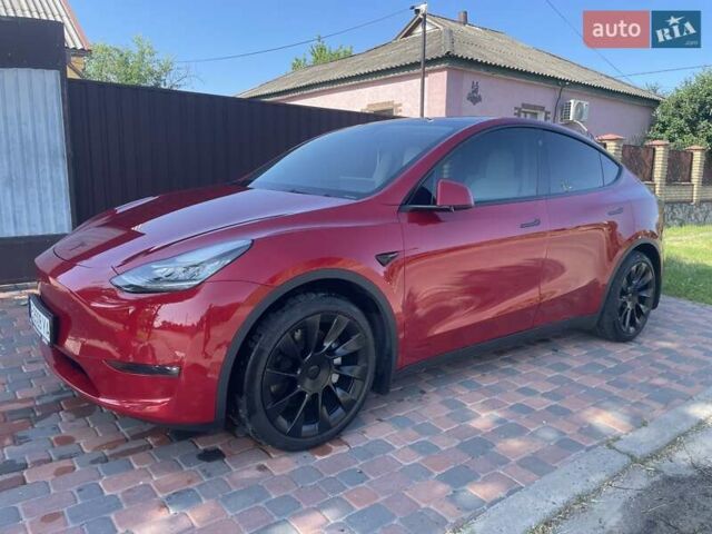 Красный Тесла Model Y, объемом двигателя 0 л и пробегом 81 тыс. км за 27500 $, фото 2 на Automoto.ua