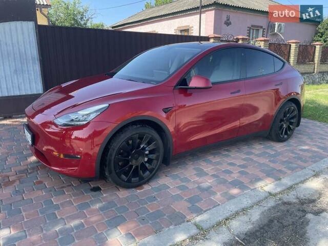 Красный Тесла Model Y, объемом двигателя 0 л и пробегом 81 тыс. км за 27500 $, фото 5 на Automoto.ua