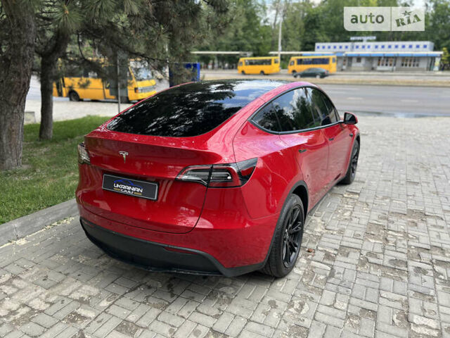 Красный Тесла Model Y, объемом двигателя 0 л и пробегом 58 тыс. км за 28500 $, фото 17 на Automoto.ua