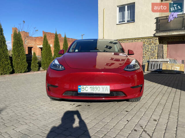 Червоний Тесла Model Y, об'ємом двигуна 0 л та пробігом 29 тис. км за 25750 $, фото 1 на Automoto.ua