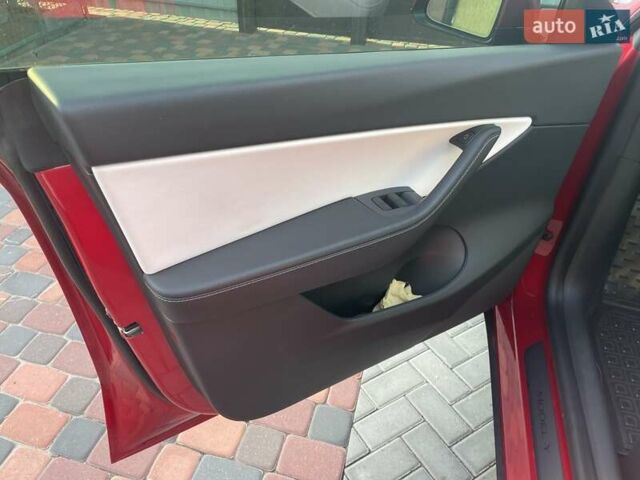 Красный Тесла Model Y, объемом двигателя 0 л и пробегом 81 тыс. км за 27500 $, фото 42 на Automoto.ua