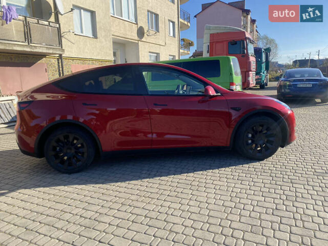 Червоний Тесла Model Y, об'ємом двигуна 0 л та пробігом 29 тис. км за 25750 $, фото 16 на Automoto.ua