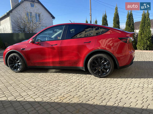 Червоний Тесла Model Y, об'ємом двигуна 0 л та пробігом 29 тис. км за 25750 $, фото 5 на Automoto.ua