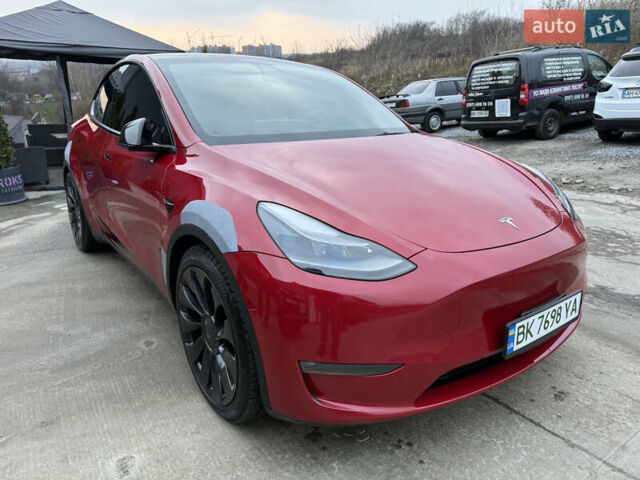 Красный Тесла Model Y, объемом двигателя 0 л и пробегом 140 тыс. км за 23000 $, фото 2 на Automoto.ua