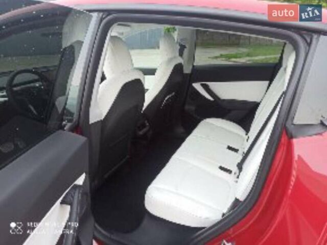 Красный Тесла Model Y, объемом двигателя 0 л и пробегом 74 тыс. км за 23600 $, фото 3 на Automoto.ua