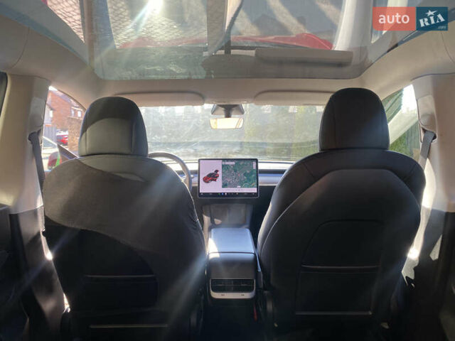 Червоний Тесла Model Y, об'ємом двигуна 0 л та пробігом 29 тис. км за 25750 $, фото 55 на Automoto.ua