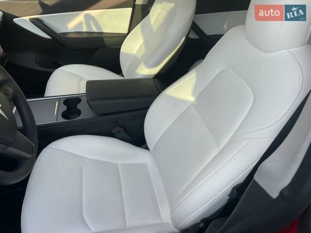 Красный Тесла Model Y, объемом двигателя 0 л и пробегом 81 тыс. км за 27500 $, фото 44 на Automoto.ua