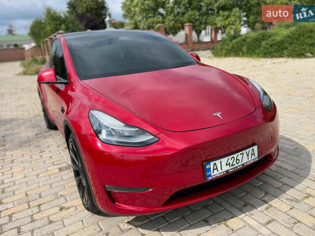 Красный Тесла Model Y, объемом двигателя 0 л и пробегом 78 тыс. км за 23999 $, фото 1 на Automoto.ua